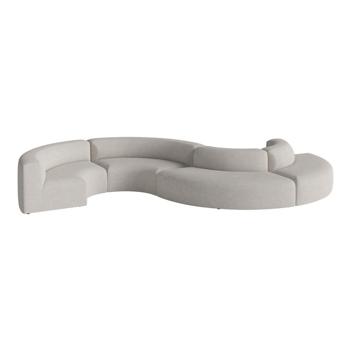 Curved, contemporary sectional sofa in a soft, light gray fabric with smooth, minimalist design. Perfect for modern spaces.