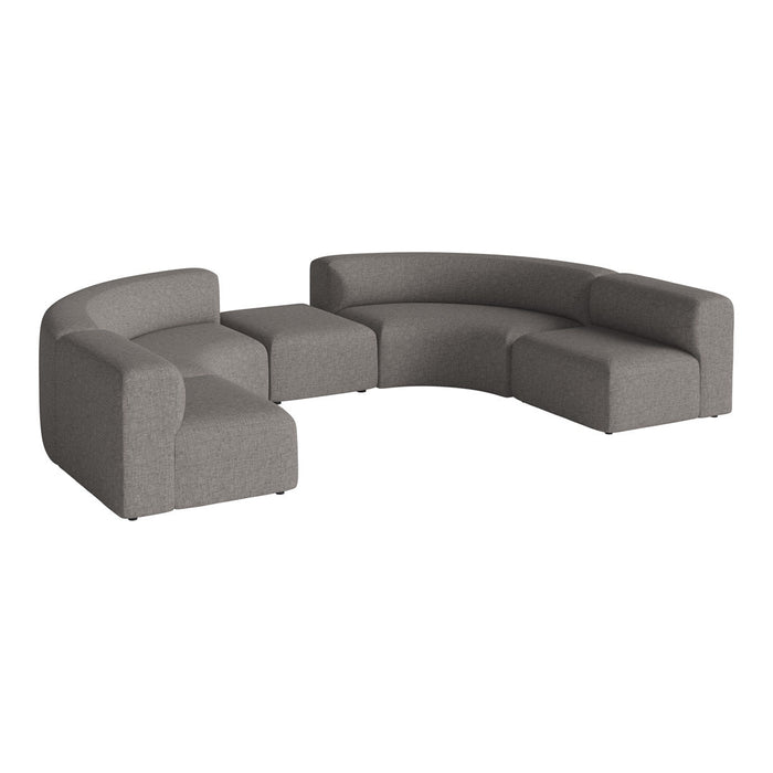 Curved modular sofa in a sleek light gray fabric with a subtle textured pattern for modern interiors.