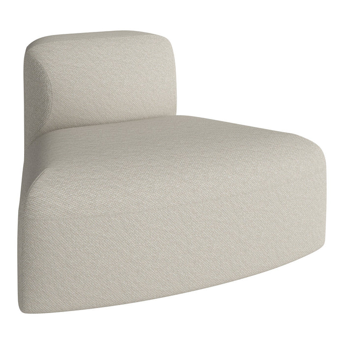 Beige curved chair with a subtle textured weave for modern indoor decor. 
