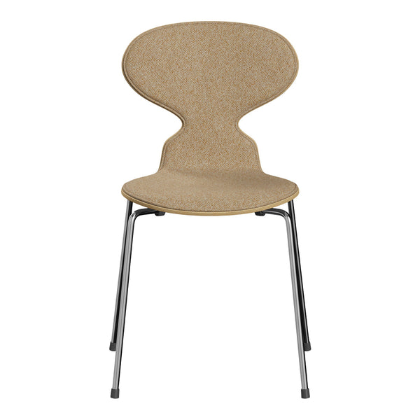 Natural sandy beige chair with a smooth, curved design and sleek silver legs, perfect for modern decor.