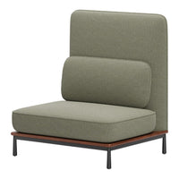 Olive green fabric sofa with a smooth texture, complemented by dark wood and black metal accents.