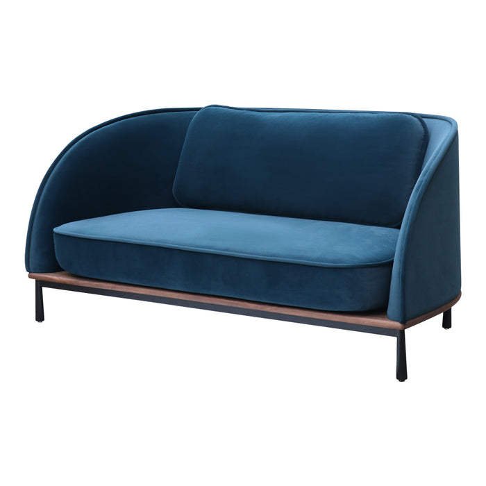 Vibrant teal velvet sofa with smooth, curved lines and a minimalist wooden base, perfect for modern decor.