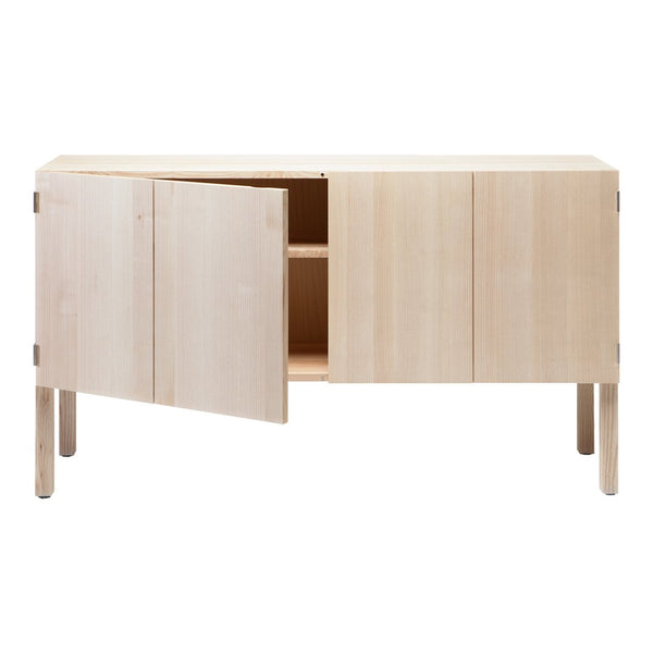 Light natural wood cabinet with a smooth, minimalistic finish and simple handle-free design.