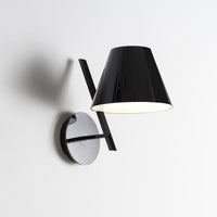 Black and chrome wall lamp with a modern, minimalist design featuring a sleek, glossy finish.