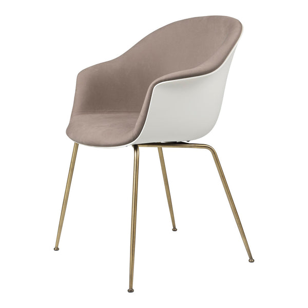 Modern chair featuring a soft beige seat and sleek white shell, complemented by elegant gold legs.
