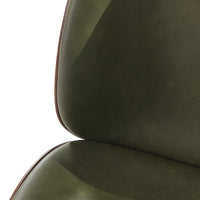 "Close-up of olive green chair upholstery with smooth texture and subtle sheen, accented by a brown trim."