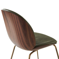 "Curved wooden chair with a rich dark walnut finish and a sleek olive green seat cushion."