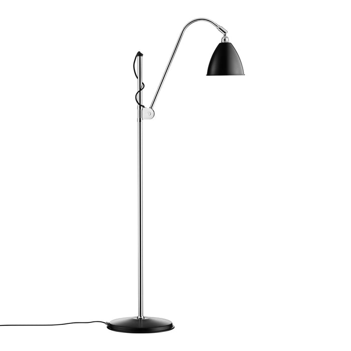 Black metal lamp with sleek silver base and minimalist design, featuring an elegant arching arm.
