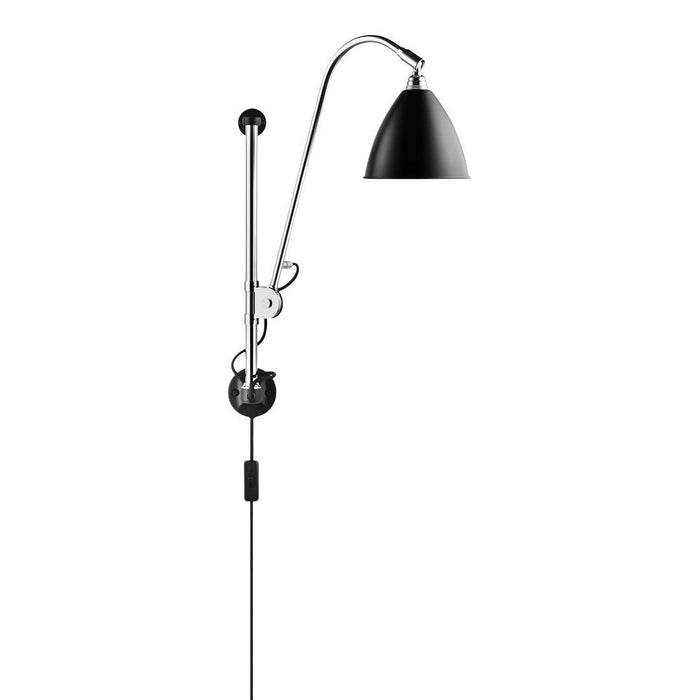 Black wall lamp with a sleek chrome arm and minimalist design, perfect for modern home decor.