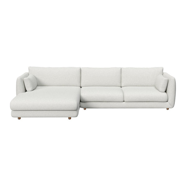 Modern white sectional sofa with clean lines and plush cushions, perfect for contemporary interiors.