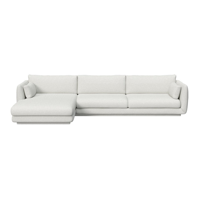 Modern white sectional sofa with smooth upholstery, featuring a minimalist design and clean lines.