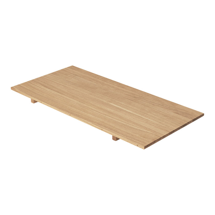 Light oak wood tabletop with a smooth, natural finish and no visible patterns, showcasing simple elegance.