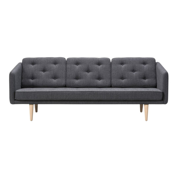 Gray tufted fabric sofa with clean lines and light wooden legs, perfect for modern living spaces.