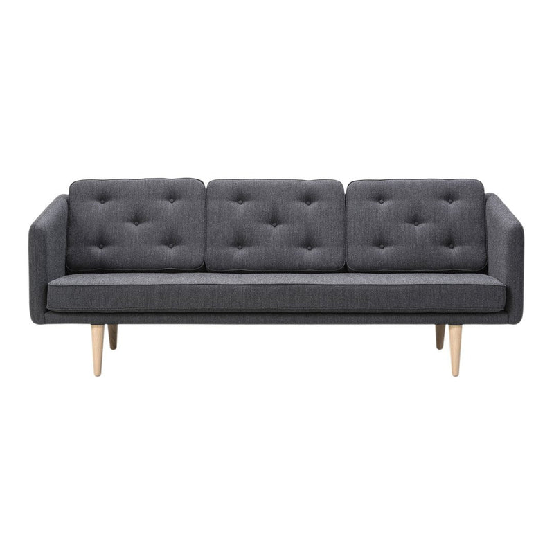 Gray tufted fabric sofa with clean lines and light wooden legs, perfect for modern living spaces.