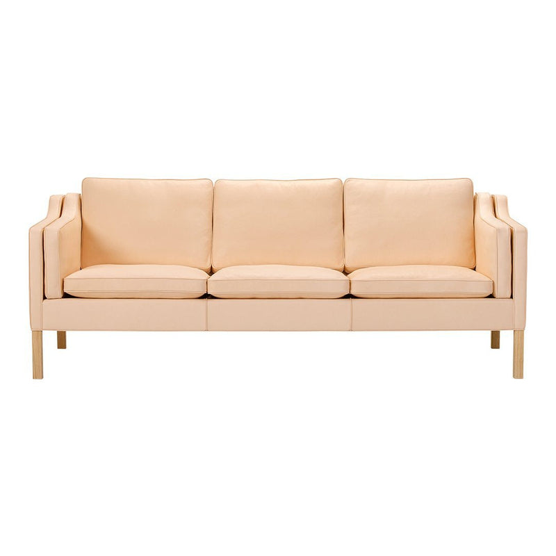 Light peach upholstery with a smooth texture and minimalist design, featuring a natural wood frame.