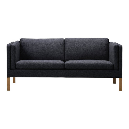 Modern dark gray fabric sofa with clean lines and light wood legs, perfect for contemporary living spaces.
