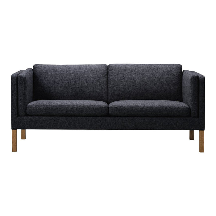 Modern dark gray fabric sofa with clean lines and light wood legs, perfect for contemporary living spaces.