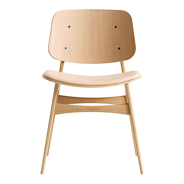 Light-colored wood chair with a smooth, minimalist design and natural finish, featuring curved lines and subtle details.