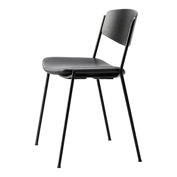 Black minimalist chair with a sleek design and smooth surfaces. Ideal for modern interiors.