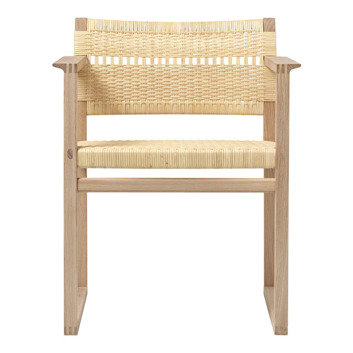 Natural wood accent chair with a woven beige seat and backrest, featuring a minimalist design. Perfect for modern decor.