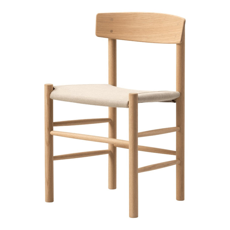 Natural wood chair with light beige fabric seat, featuring minimalistic design and soft, neutral tones.