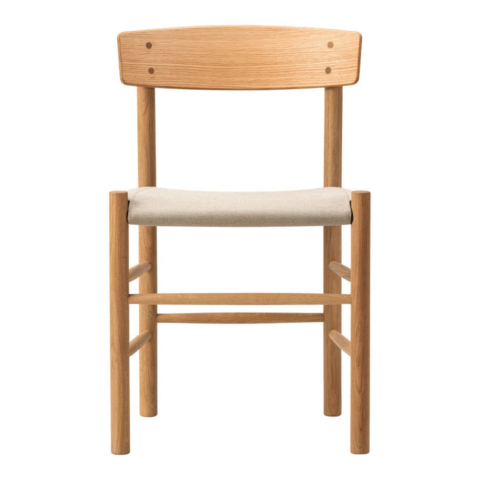 Natural oak chair with a light beige fabric seat, featuring a minimalist design and smooth, clean lines.