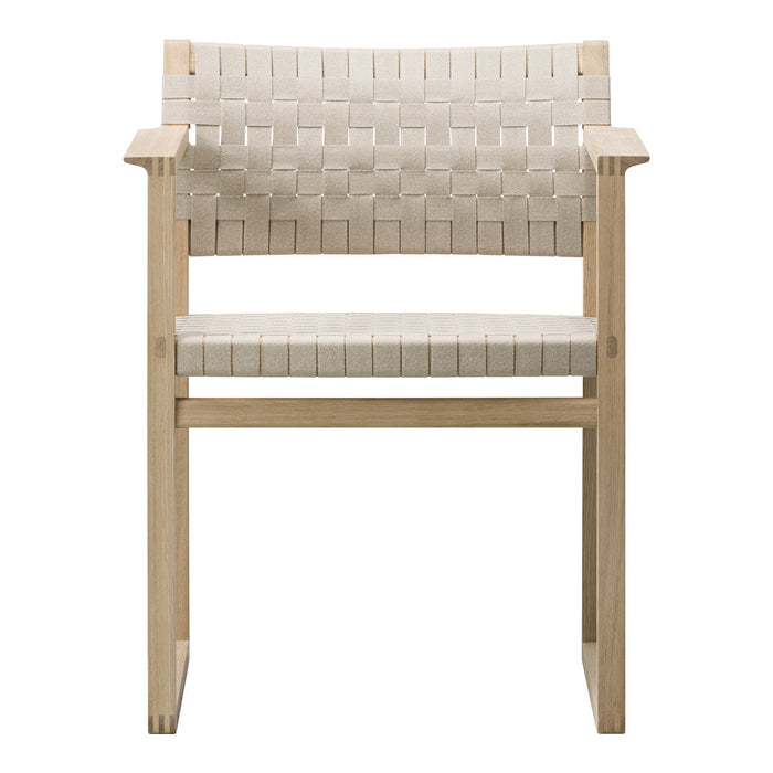 Beige woven pattern chair with a light wooden frame, showcasing a modern and minimalist design.