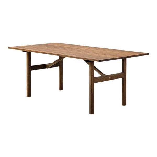 "Sturdy wooden dining table in warm brown tones with a smooth finish and simple, modern design."