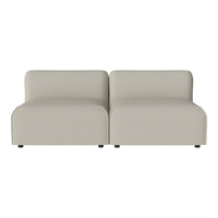 Beige modular sofa in a smooth, minimalist design with a solid color and no patterns. Perfect for modern interiors.