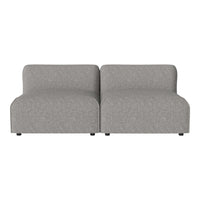 Gray upholstered modular couch with a smooth, textured pattern and rounded edges, perfect for modern living spaces.