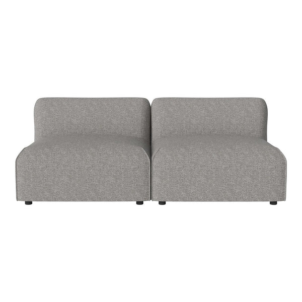 Gray upholstered modular couch with a smooth, textured pattern and rounded edges, perfect for modern living spaces.