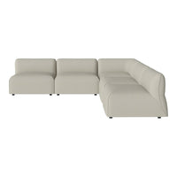 Beige sectional sofa with smooth, minimalist design and subtle stitching patterns. Ideal for modern living spaces.