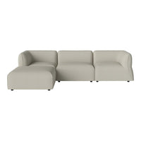 Light beige sectional sofa with a smooth, modern design and clean lines, perfect for contemporary living spaces.