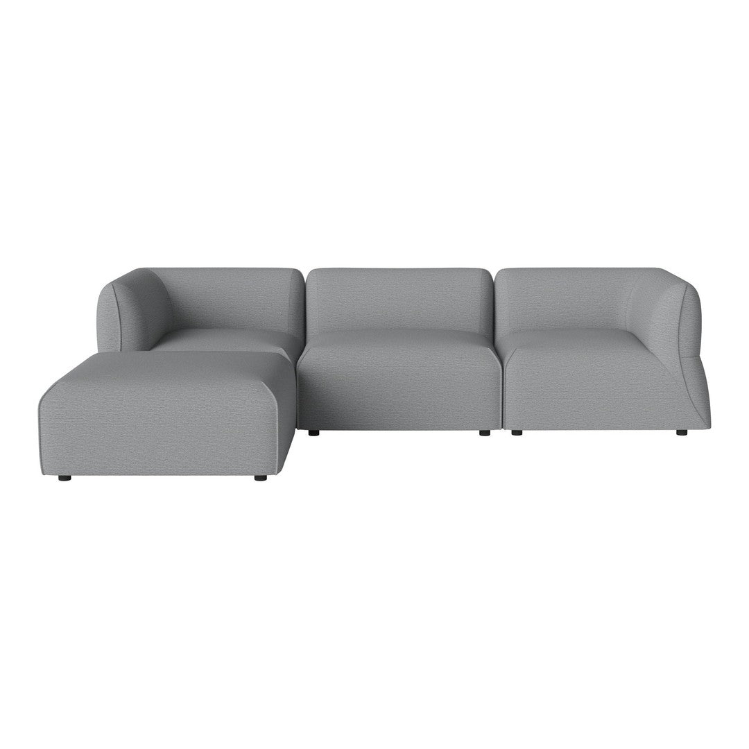 Gray sectional sofa with smooth, modern design and rounded edges, perfect for any contemporary living space.