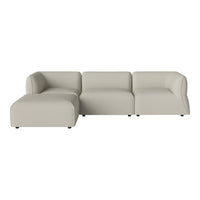Light beige sectional sofa with a smooth, minimalist design and rounded edges. Perfect for modern decor.