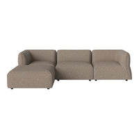 Beige sectional sofa with plush upholstery and smooth, modern lines, perfect for contemporary living spaces.