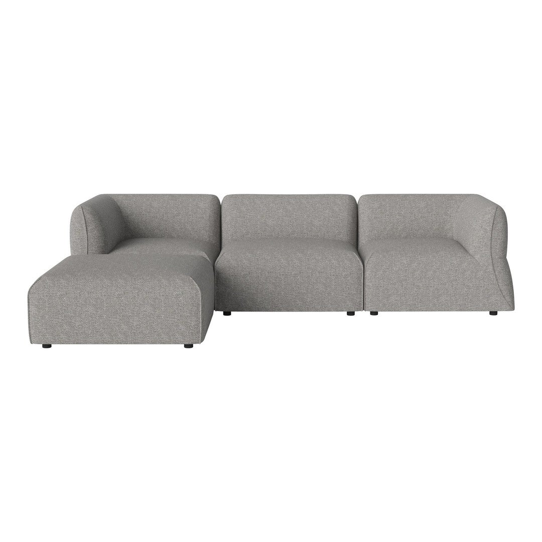 Light gray sectional sofa with a smooth fabric texture and clean, modern design, perfect for any contemporary living space.