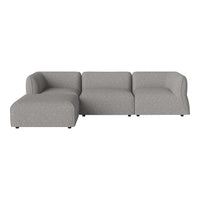 Light gray sectional sofa with a smooth fabric texture and clean, modern design, perfect for any contemporary living space.