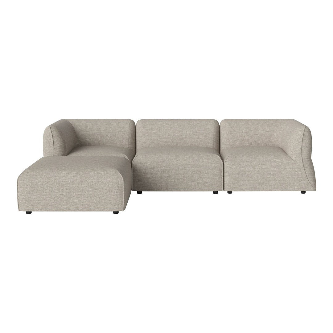 Beige sectional sofa with a smooth, minimalist design and subtle curves, perfect for modern living spaces.