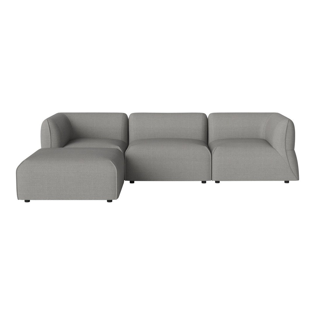 Light gray upholstered sectional sofa with smooth, minimalist design and no visible patterns. Perfect for modern decor.