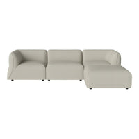 Light beige sectional sofa with smooth, minimalist design and no visible patterns, perfect for modern interiors.