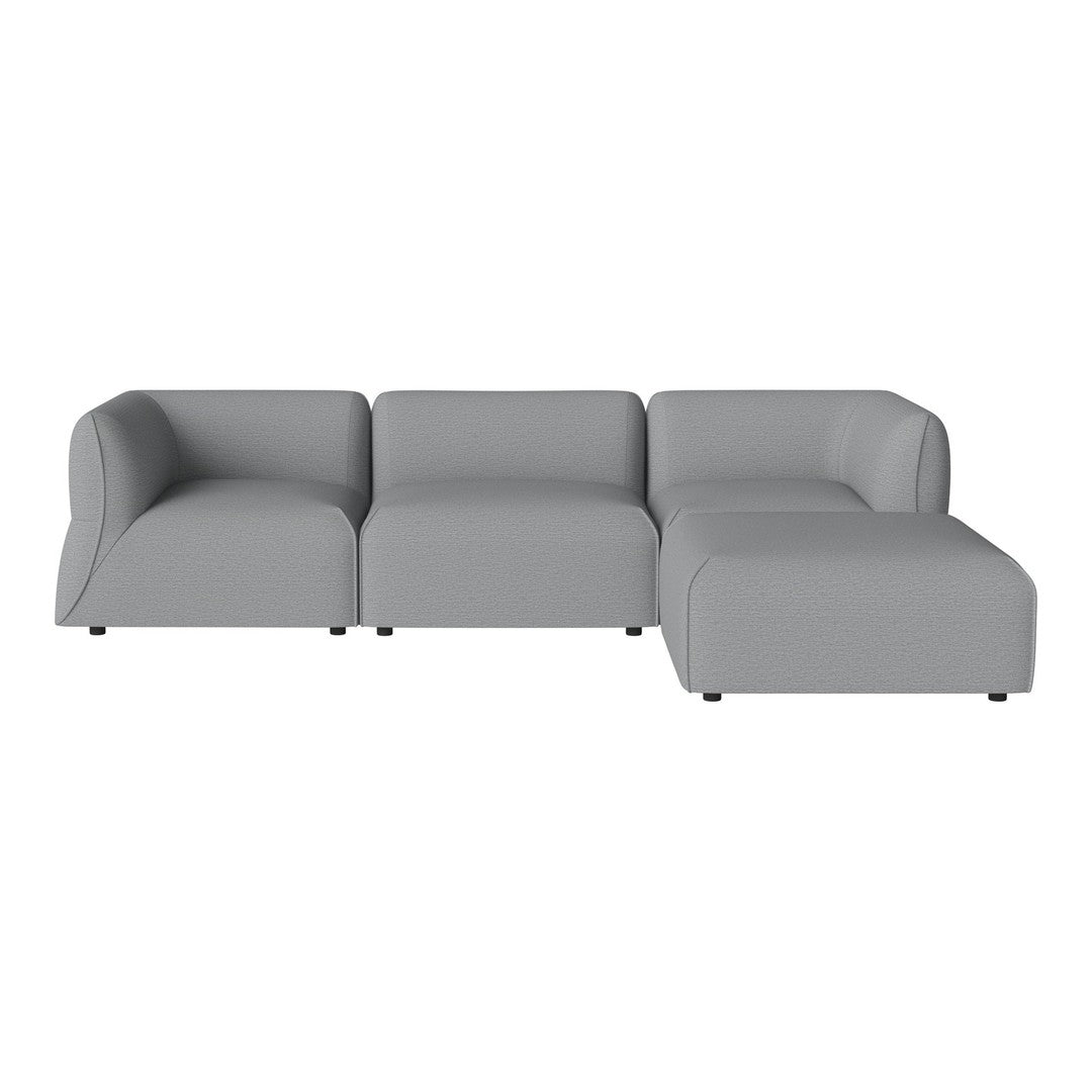 Gray sectional sofa with smooth, modern lines and a minimalist design. Ideal for contemporary living spaces.