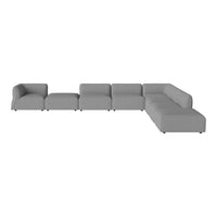 L-shaped sectional sofa in light gray fabric with smooth, minimalist design and no visible patterns.