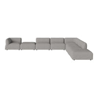 Gray modular sectional sofa with smooth fabric and contemporary design, perfect for minimalistic decor.