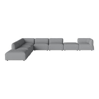 Gray sectional sofa with a minimalist design and smooth fabric, perfect for modern living spaces.