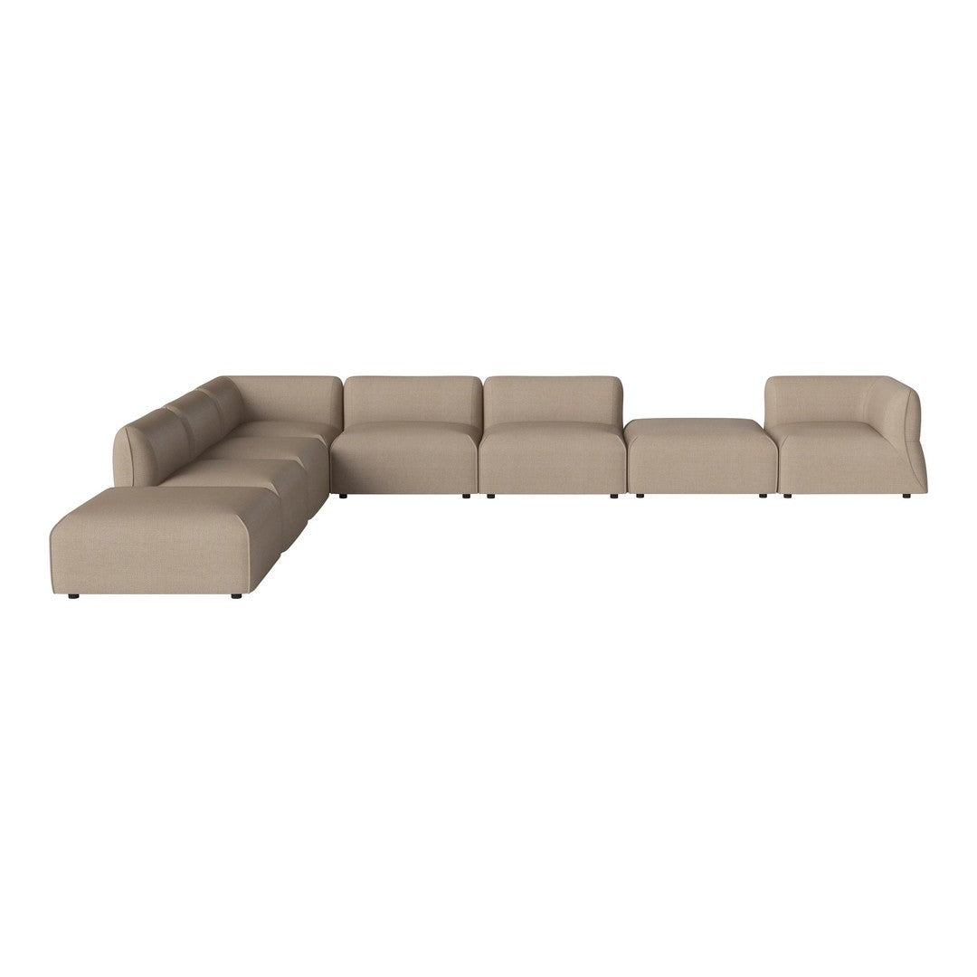 Beige sectional sofa with a minimalist design and smooth fabric pattern, perfect for modern living spaces.