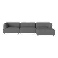 Modern grey sectional sofa with smooth fabric and minimalist design, perfect for contemporary living spaces.