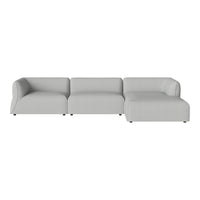 Gray modular sofa with smooth fabric and streamlined, contemporary design. Ideal for modern living spaces.