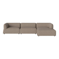 Beige sectional sofa with a smooth, textured fabric and modern design, perfect for contemporary living spaces.
