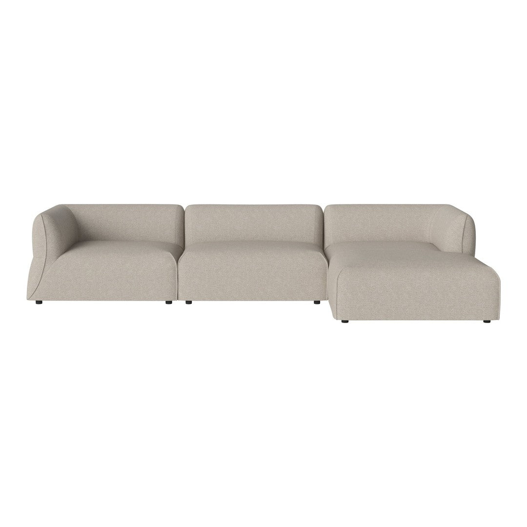 Beige sectional sofa with smooth fabric and minimalist design, perfect for modern living spaces.